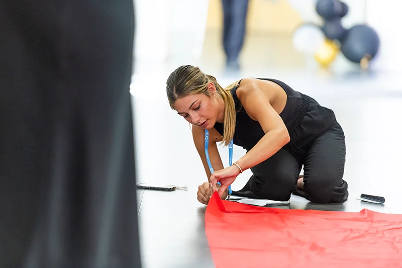 Young lady preparing a banner
