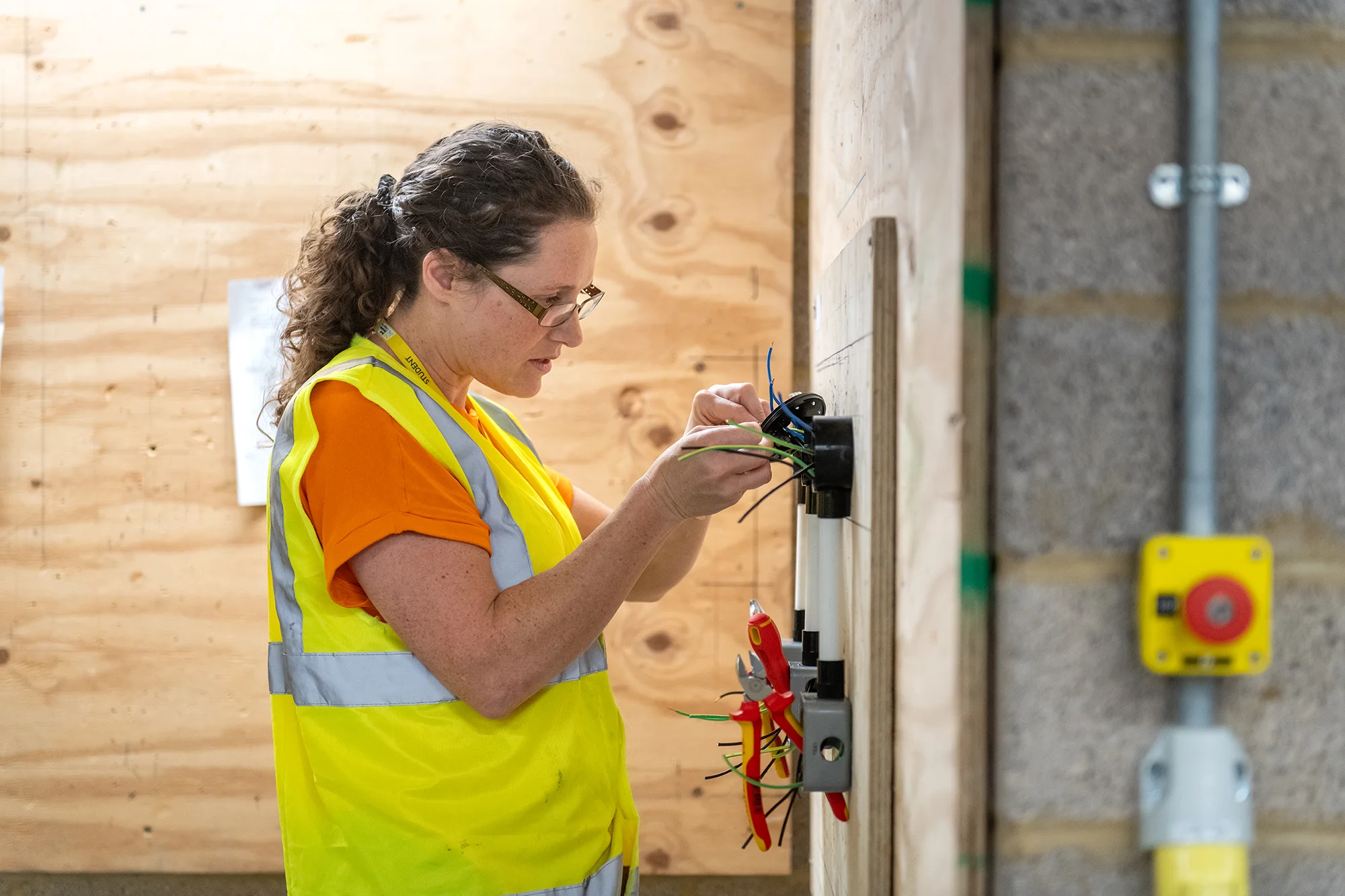 Lady wiring a socket