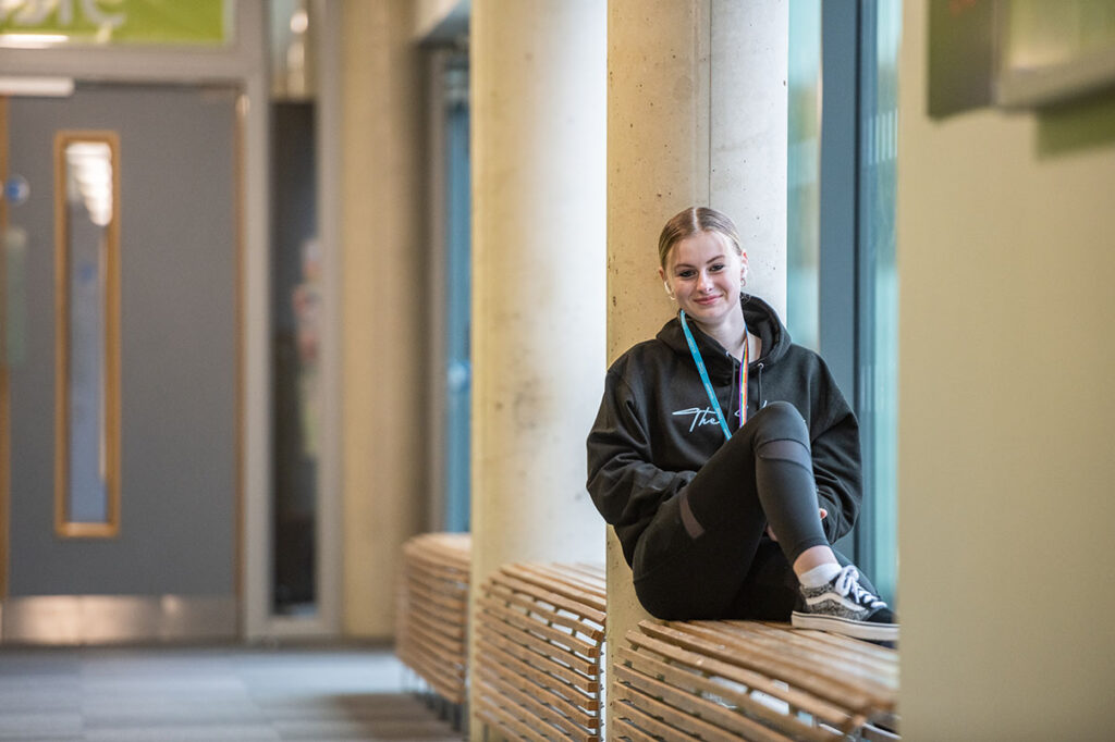 Student Sitting in corridor